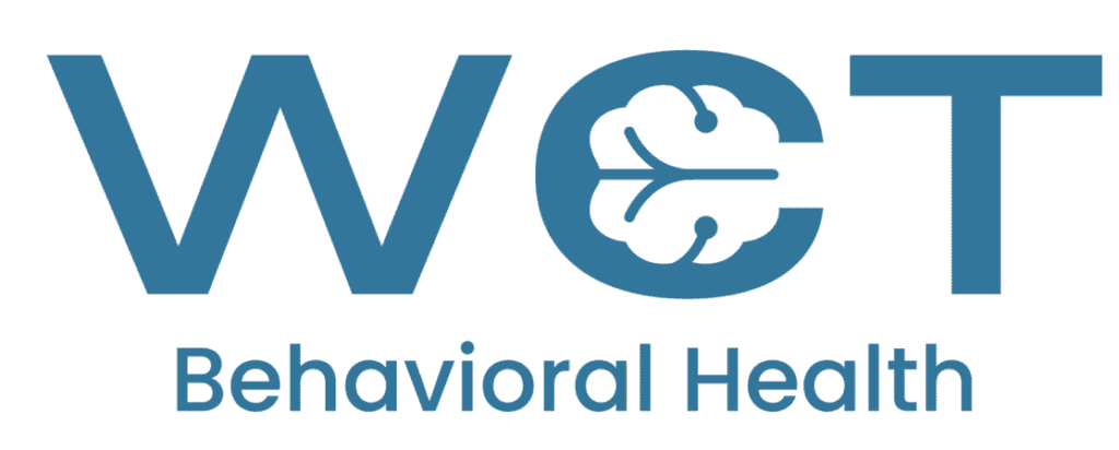 WCT Behavioral Health logo with a stylized brain icon and text.